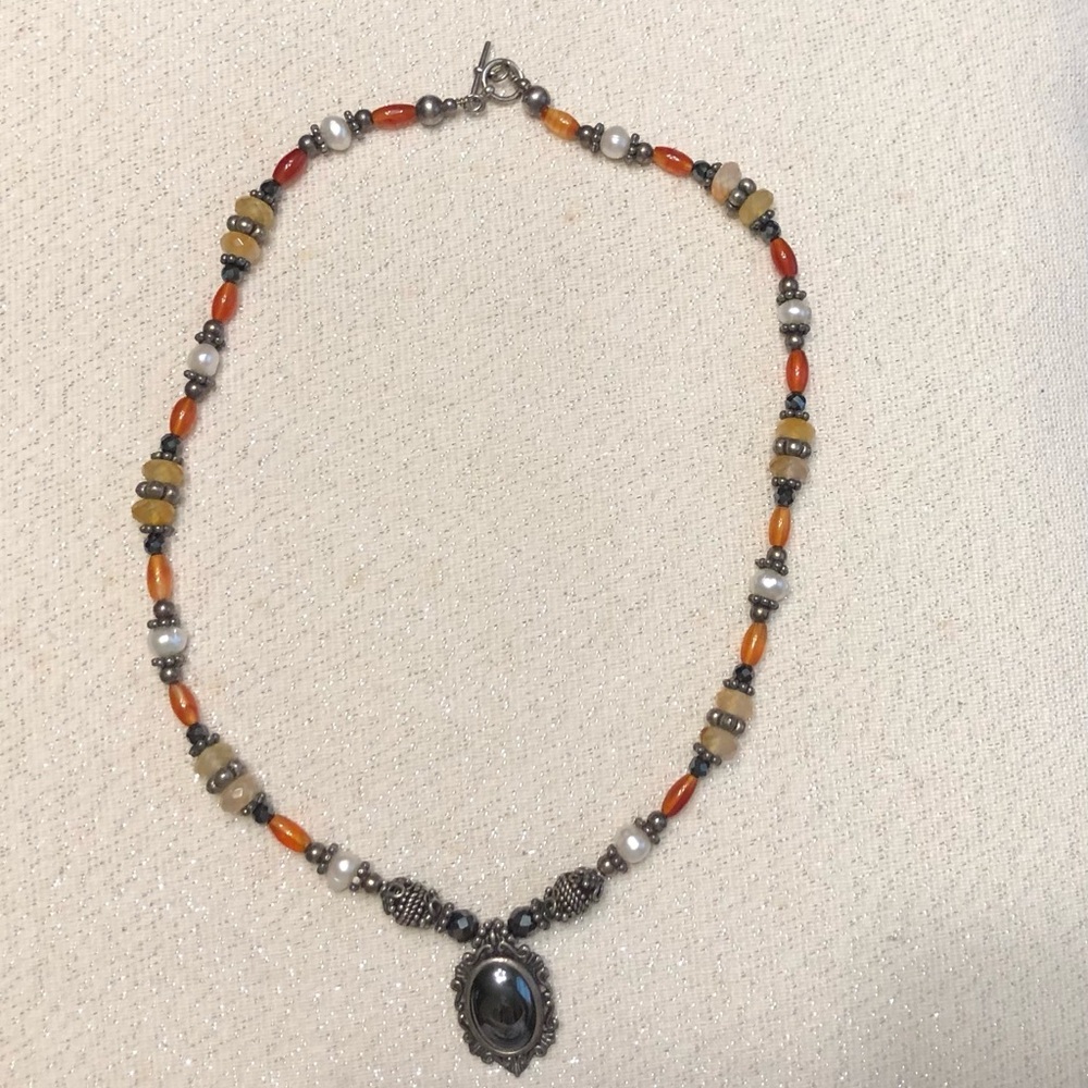 Handcrafted Silver Pendant Necklace with Orange and Cream Beads